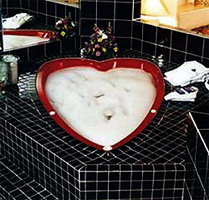 King bed with heart shaped Jacuzzi