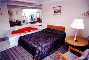 Deluxe Room with heart shape jacuzzi